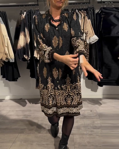 Vintage printjurk met revers en knoopjes